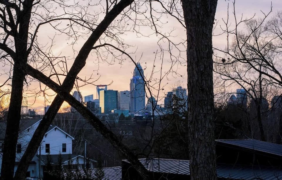 Charlotte skyline views from the rooftop create a hidden urban escape just minutes from Uptown. Take in beautiful sunsets and city views while relaxing at your private rooftop retreat at Teeni Santorini.