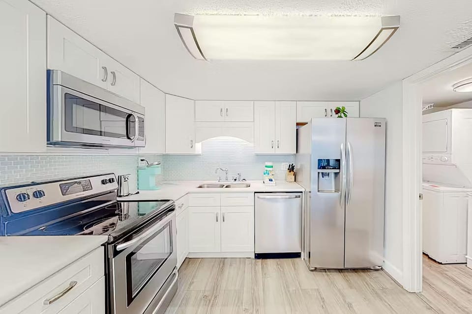 Condo, Multiple Beds (Pinnacle Port A-929) | Private kitchen | Oven, toaster, cookware/dishes/utensils