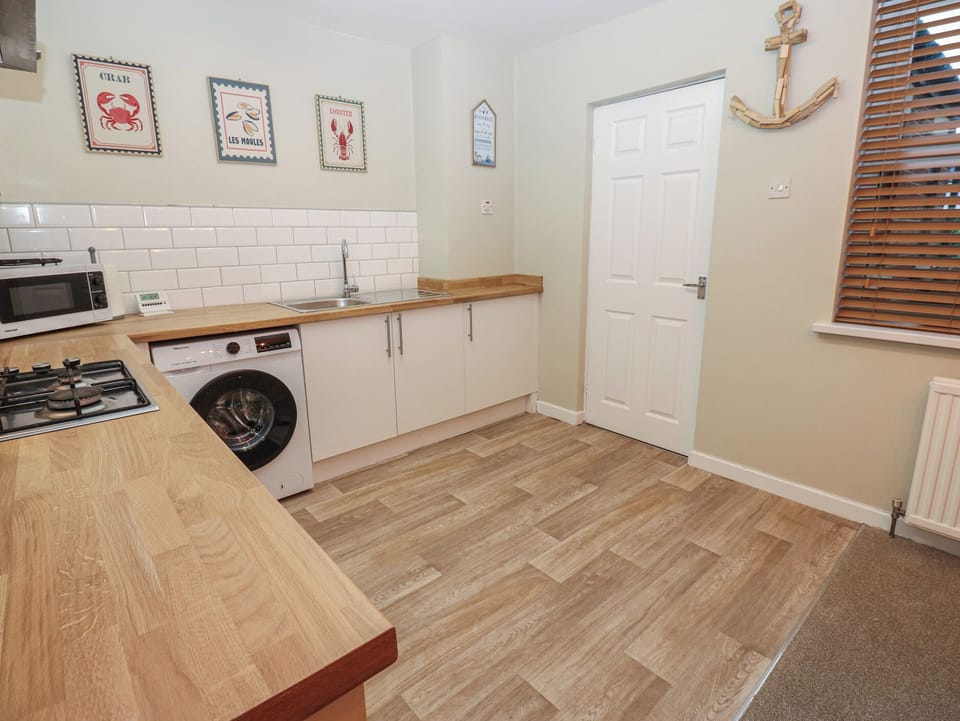 Fridge, microwave, toaster, cookware/dishes/utensils