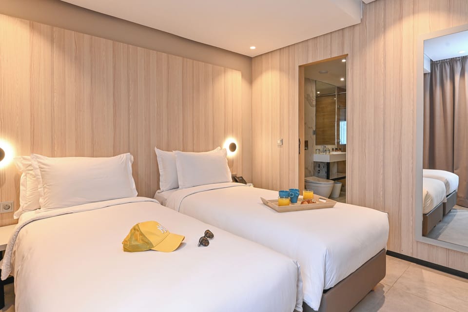 Deluxe Twin Room, City View | Individually decorated, individually furnished, desk, blackout drapes