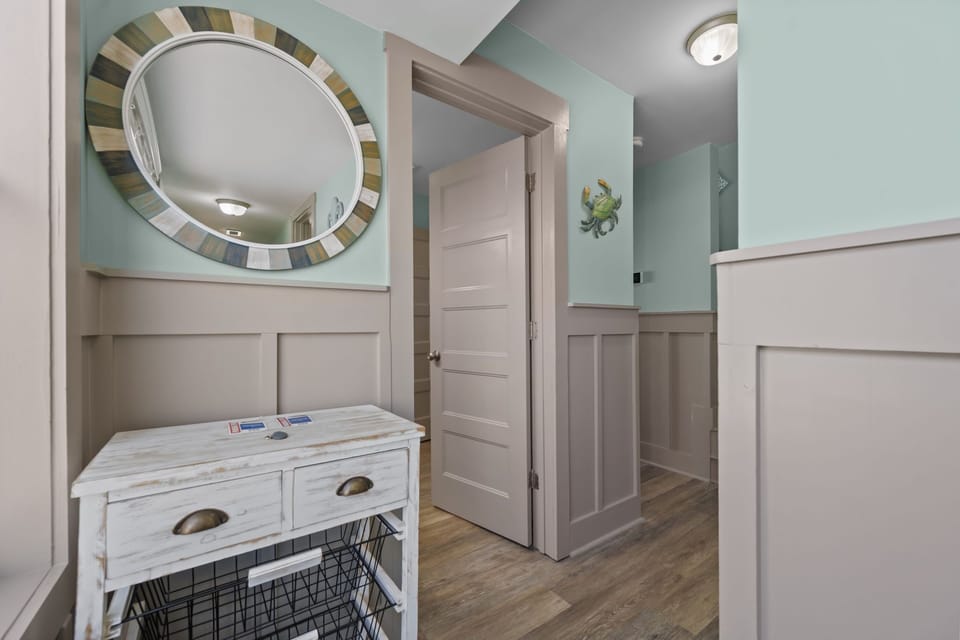 Entry area with stylish shiplap accents and practical storage
