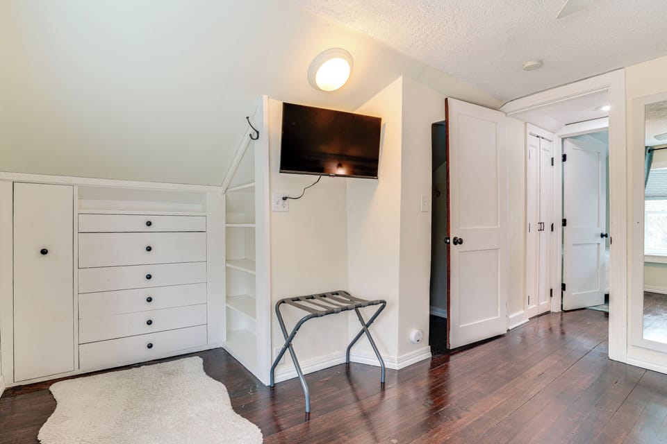 The King bedroom comes with a smart TV and plenty of luggage space.