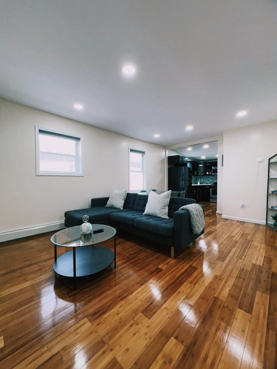 Living room area with additional bean bag for relaxing.