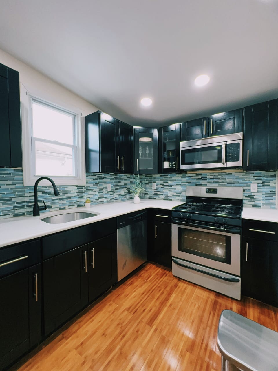 blender, coffee machine, microwave, dishwasher and toaster accessible for use.