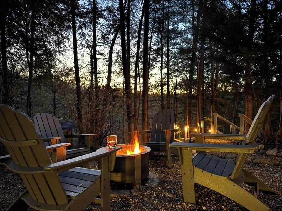 Breeo firepit + Polywood Adirondacks. Woodshed is to the left of the photo.