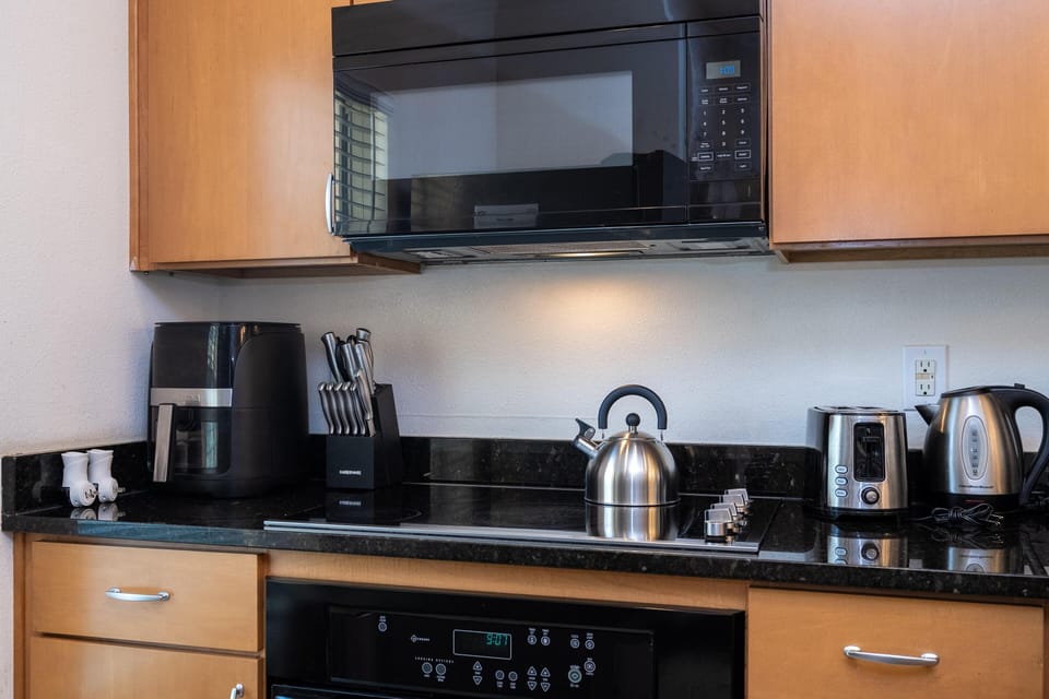 Modern kitchen with sleek appliances and ample counter space