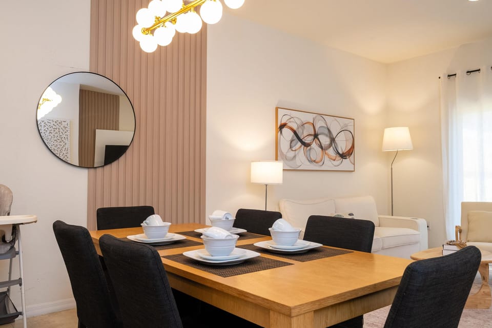 Modern dining area with cozy lighting and stylish decor