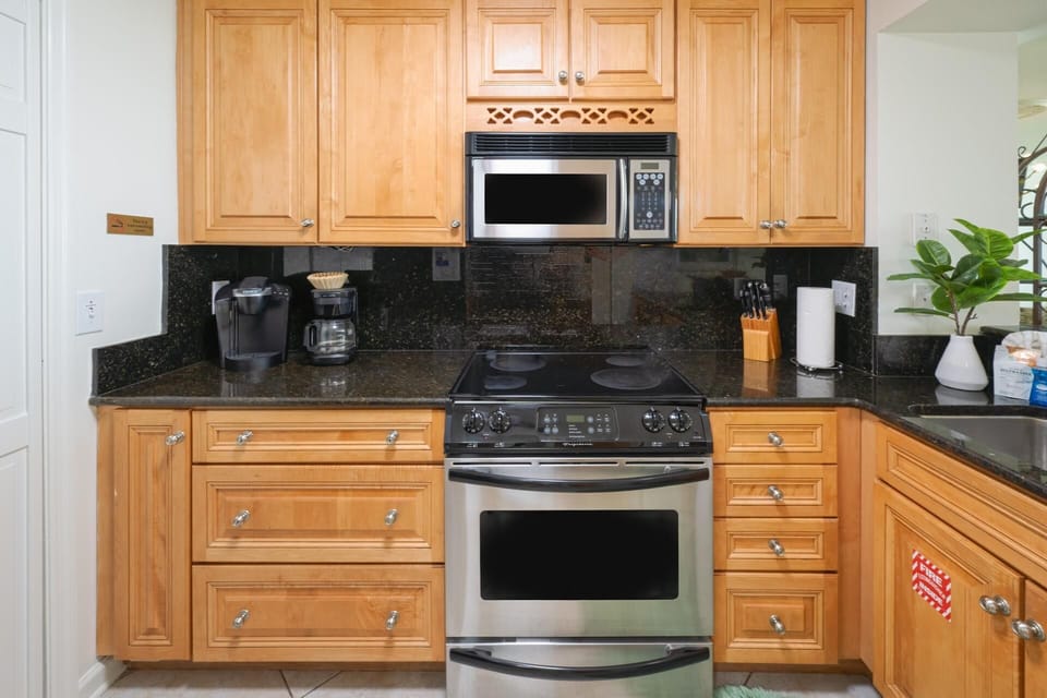 Fully equipped kitchen with modern appliances and ample counter space