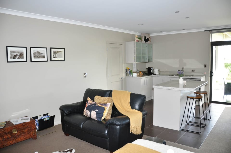 Kitchen full view with sofa