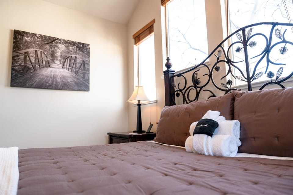 Sink into plush bedding designed for ultimate relaxation.