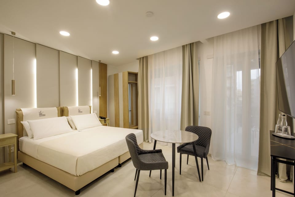 Standard Double Room, 1 King Bed | Minibar, in-room safe, desk, blackout drapes