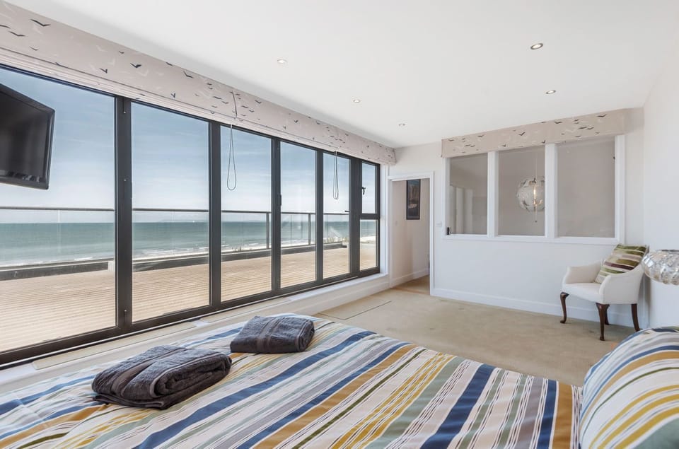 King size bedroom with beach views