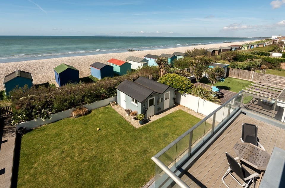 Balcony with beachfront garden and beach views