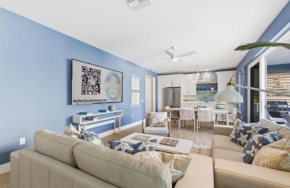 Living room on the 1st floor has 80" smart TV