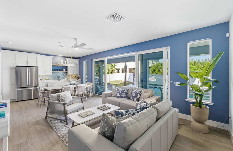 Seamless flow between living, dining, and kitchen.