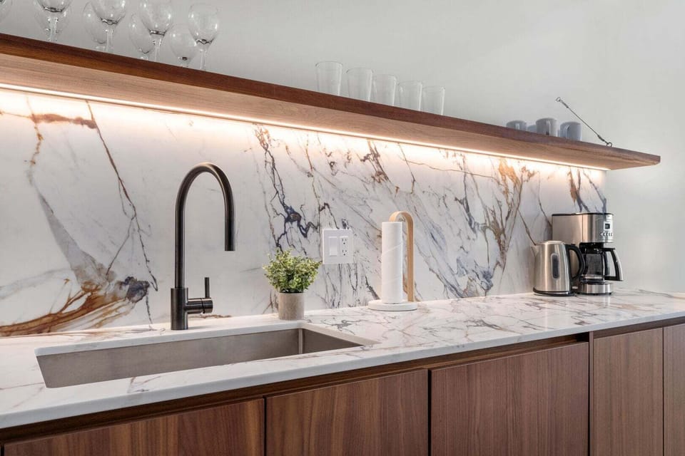 Modern cabinetry, elegant glassware, and a beautifully designed kitchen for every occasion