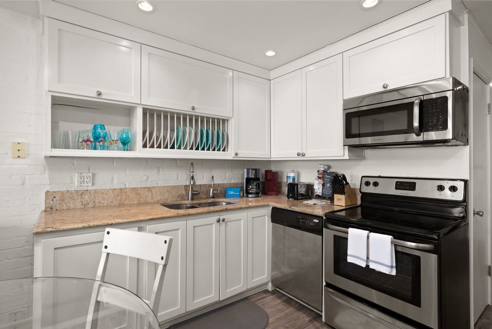 Bright, clean kitchen with plenty of space to cook and prepare meals with ease.