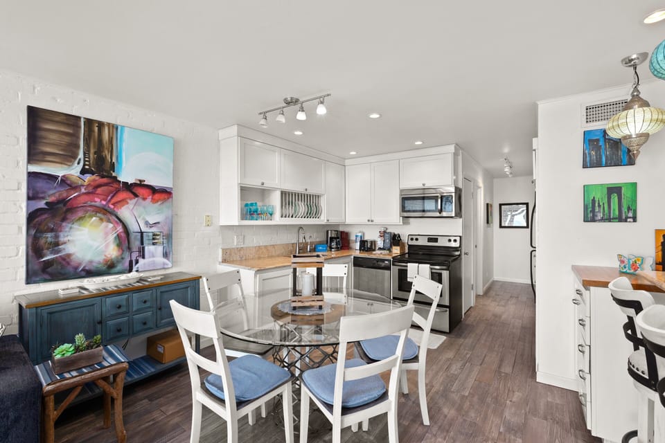 Gather together in the open dining area and fully equipped coastal kitchen