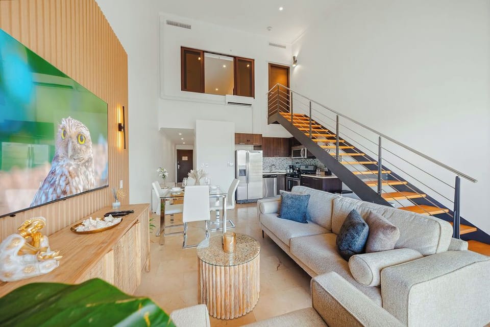 Modern loft living at its finest. Enjoy soaring ceilings, curated décor, and an open-concept layout designed for both relaxation and entertaining. A space that feels as good as it looks.