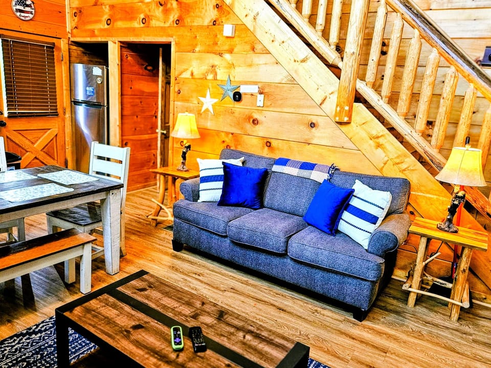 A comfy couch and plush throw pillows.