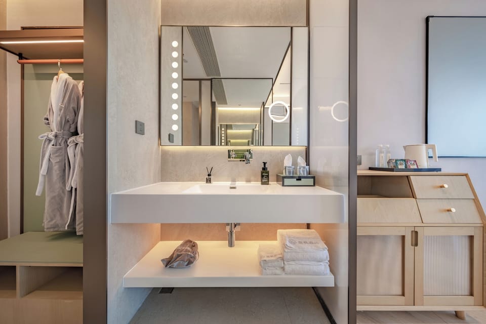 Family Triple Room, Partial Lake View | Desk, laptop workspace, blackout drapes, soundproofing