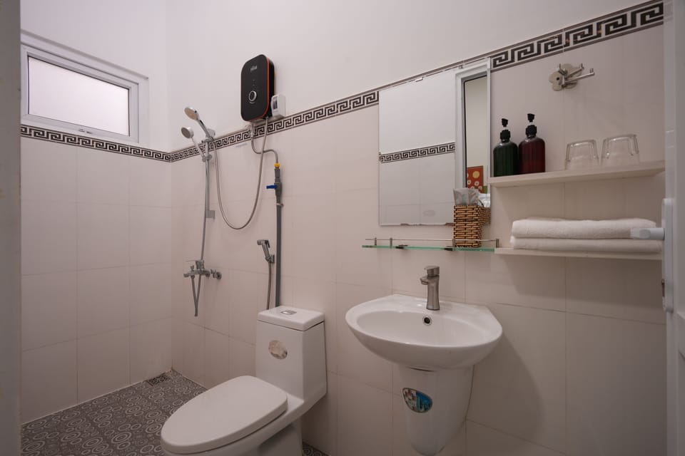 Basic Double Room Single Use | Bathroom | Hair dryer, slippers, towels, soap