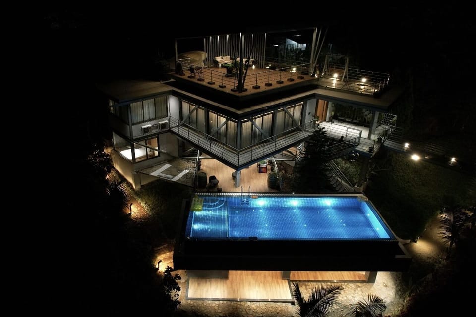 “A bridge between nature and luxury, glowing beautifully under the stars.”      