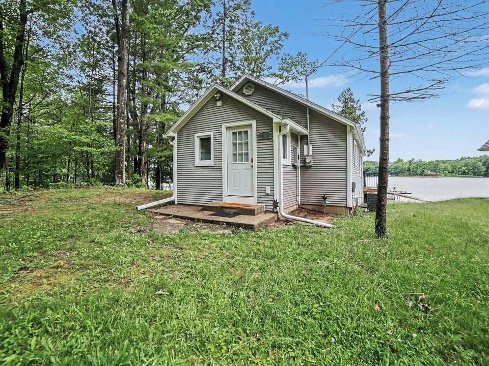 Main Entry Door - View of the front of the cottage from the parking area and main entry door