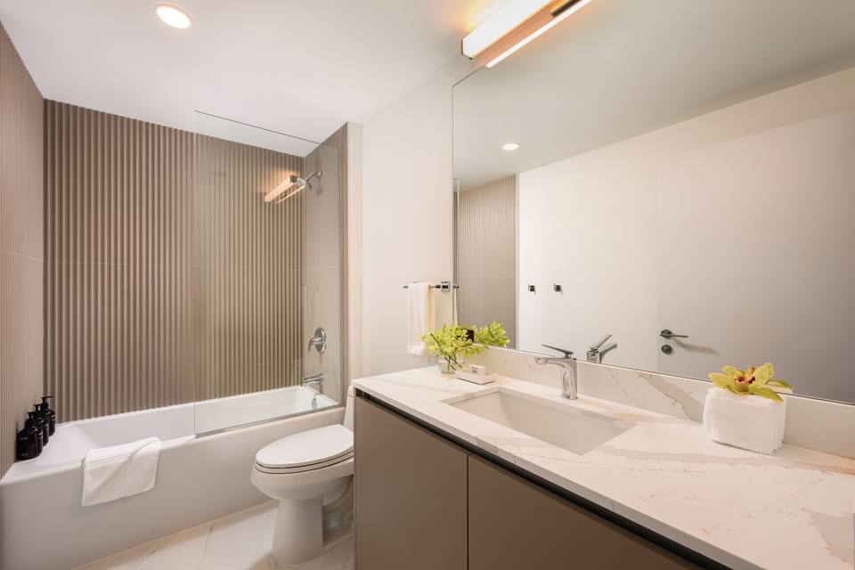 Full bathroom features a shower and tub combo.