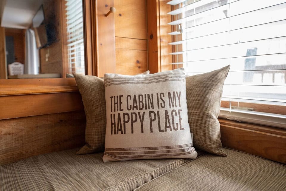 “The cabin is my happy place.” And once you curl up here with a book, a cup of coffee, and soft natural light pouring in—you’ll probably agree.