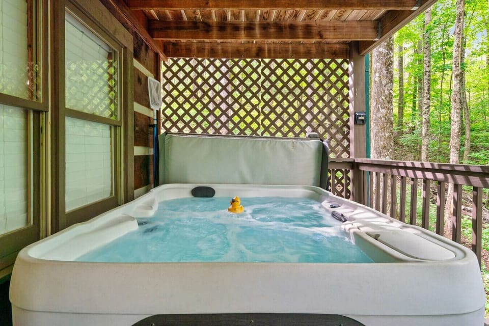 Slip into the bubbling hot tub, listen to the sounds of the forest, and let the warm water melt away the day. It’s your own secluded spa tucked into the trees.