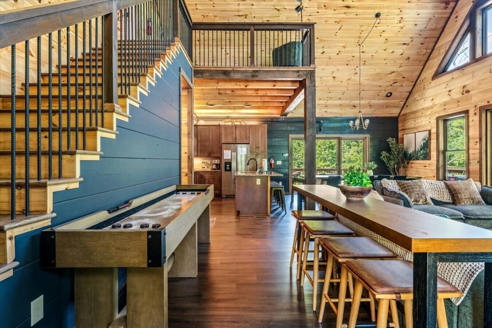 The open-concept living area brings together the kitchen, dining room, and comfortable seating so your entire group can gather without feeling crowded.