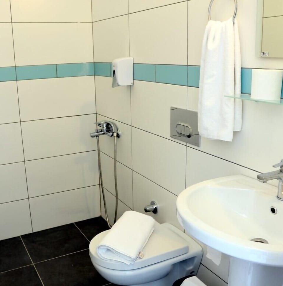 Free toiletries, hair dryer, slippers, towels