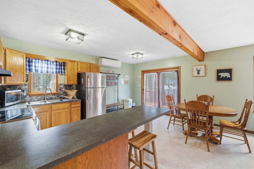 Open-concept kitchen and dining area designed for easy flow.