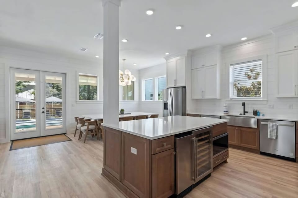 Easy access to the backyard patio brings a seamless indoor–outdoor feel.