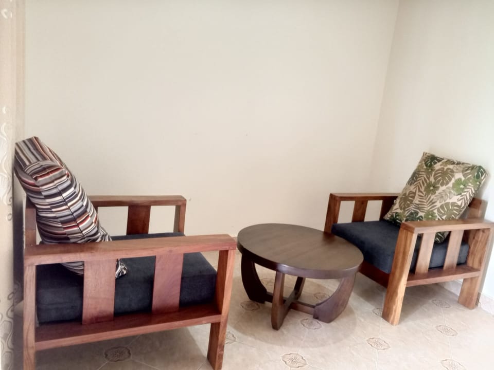 Deluxe Double Room, Balcony | Living area | 32-inch Smart TV with digital channels, streaming services