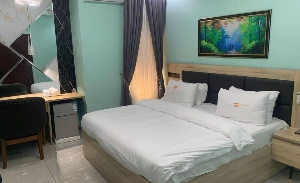 Classic Room, Balcony, City View | Desk, laptop workspace, blackout drapes, soundproofing