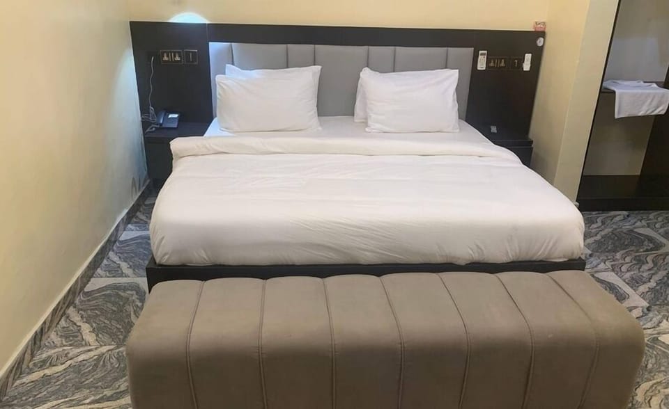 Classic Room, Balcony, City View | Desk, laptop workspace, blackout drapes, soundproofing