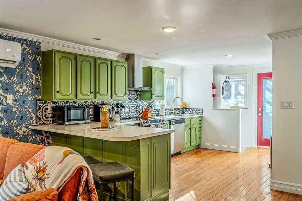 From breakfast to board games, the open-concept design keeps everyone connected in one bright, happy space.