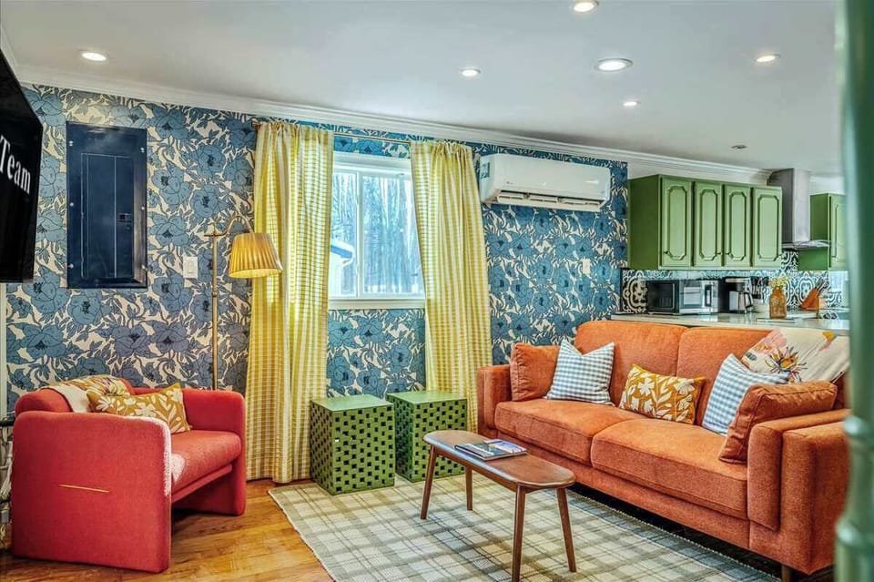 Stretch out, snuggle up, and stay awhile. This living room was designed for one thing: total relaxation (with a side of fun).