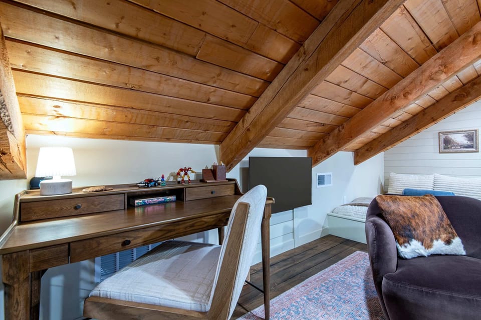 The desk area is great for remote work, writing, or kids’ activities.