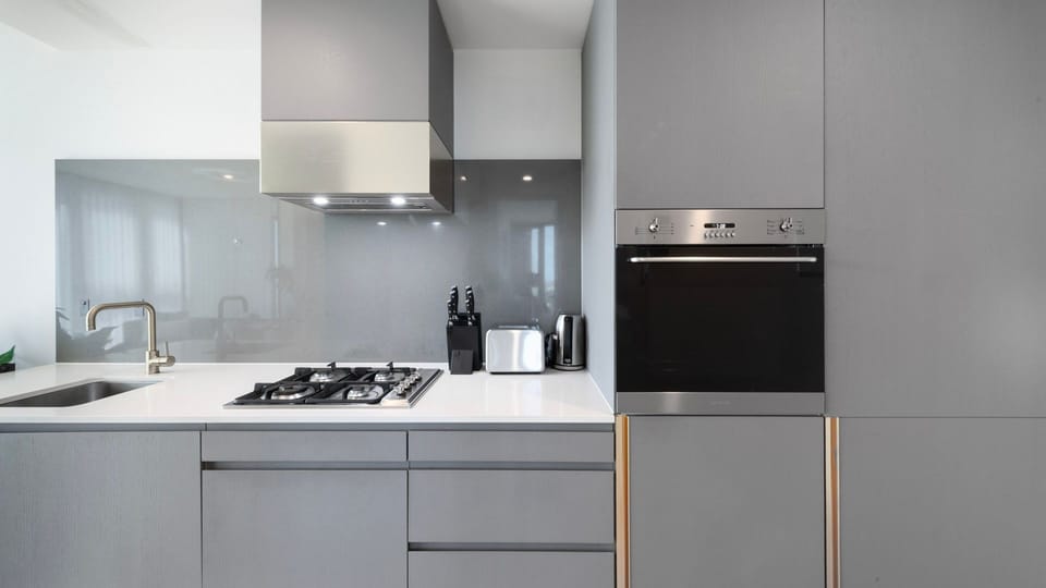 Built in oven cooktop and minimalist cabinetry