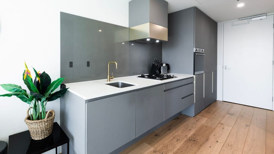 Fully equipped modern kitchen with clean finishes