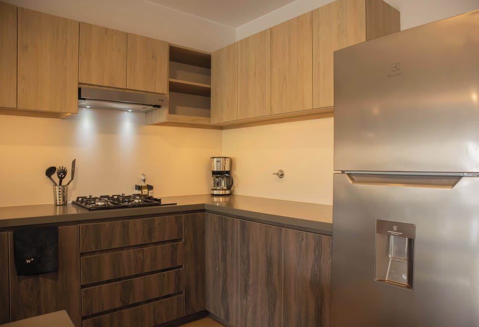 A stylish kitchen with granite countertops