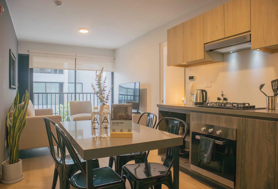 Integrated dining and living area designed for comfort and style.