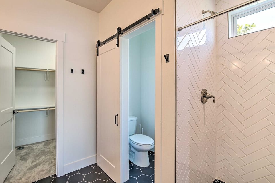 Bathroom 1 | Walk-In Shower | Sleek Tile | Handy Closet Access