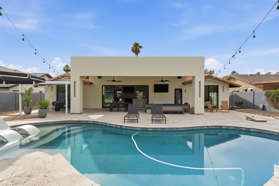 Private resort-style backyard with pool and expansive seating