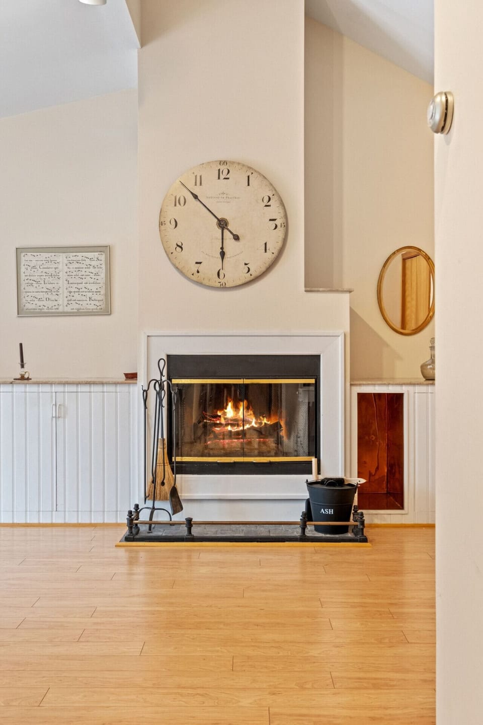 A warm fireplace setup in the main bedroom!
