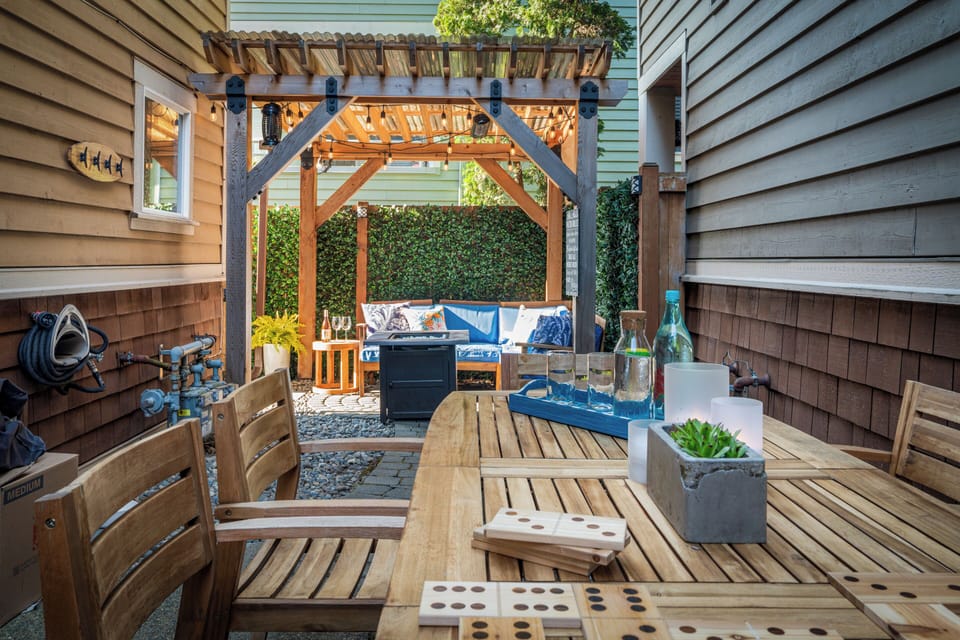 Gather under the pergola for sunset drinks, outdoor games