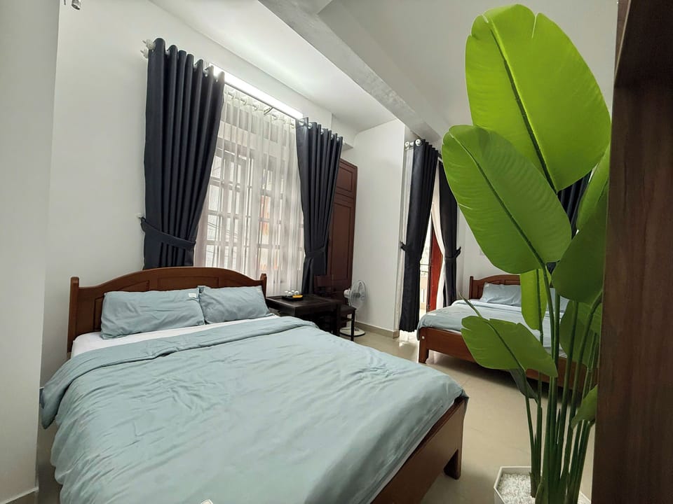 Family Triple Room, Balcony, City View | Blackout drapes, iron/ironing board, free WiFi